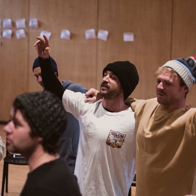 Men in a learning session